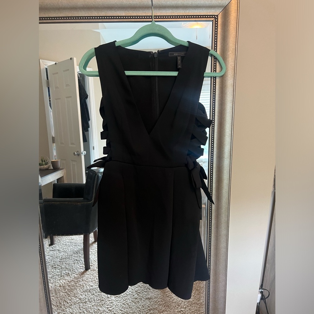 Black BCBG cocktail dress with tie up side and bow detail
